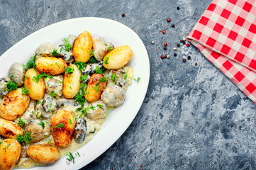 Baked potatoes with mushrooms
