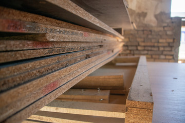 Taking photographs of wood plywood, used for making pellets