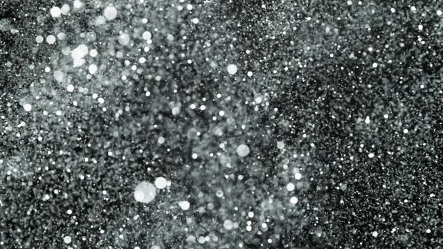 SIlver Glitter Explosion in Super Slow Motion at 1000fps.