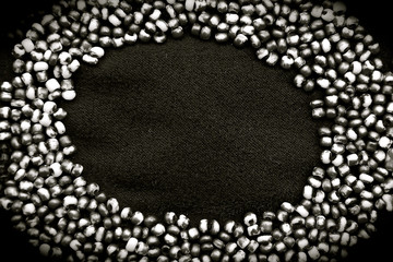 Black and white image of small glass beads
