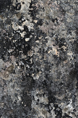 old black wall  with deteriorated paint