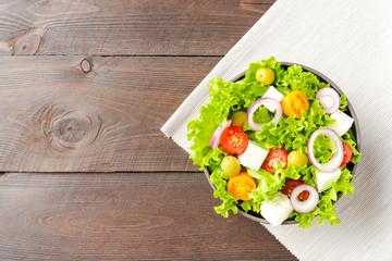 Green salad with feta cheese. Top view