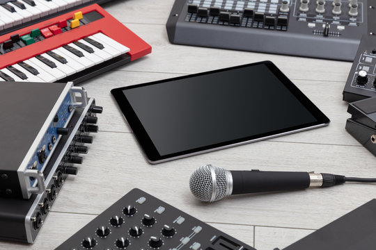 Empty tablet and electronic music instruments