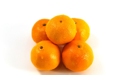 On a white background tangerines - fresh, clean, with water drops