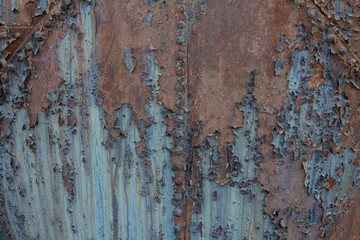 Background of riveted metal with rust and peeling paint texture, horizontal aspect