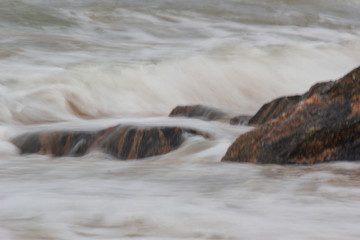 sea rock is breaking powerful wave