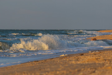 Powerful Waves crushing on a rocky beach