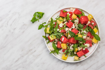 Summer Fresh Watermelon  and Feta Salad on Marble Table