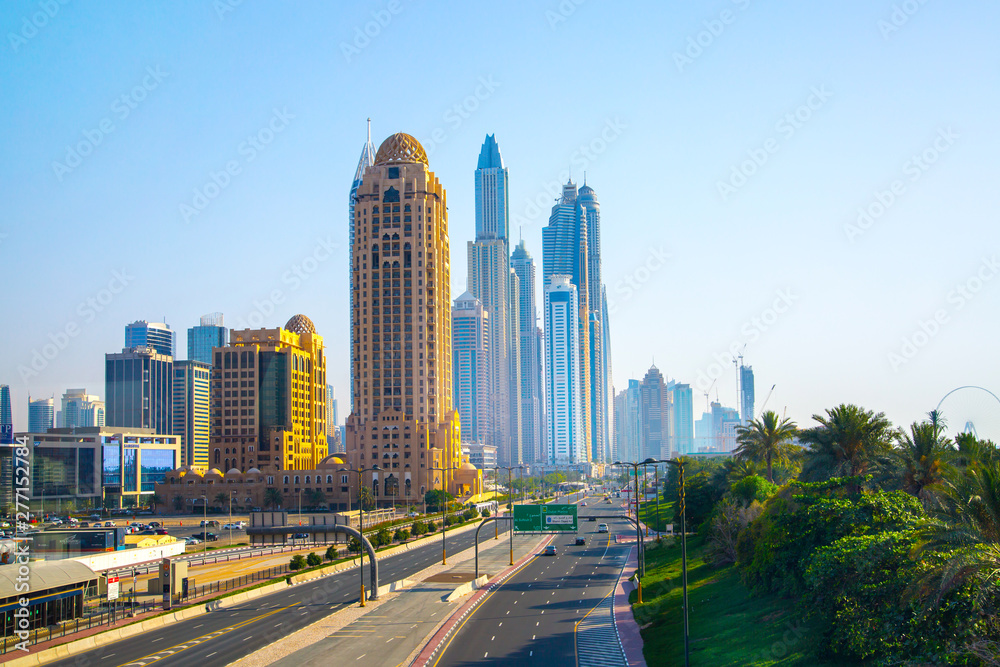 Canvas Prints Dubai, UAE United Arabs Emirates.  Arjaan building and Dubai marina skyscrapers at the background. King Salman Al Saud highway view. Hotels and office buildings of UAE