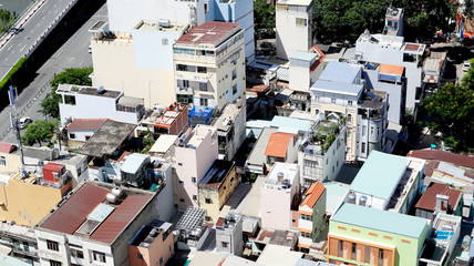 Fototapeta premium Close up the City Buildings and Roads from Aerial View, Saigon