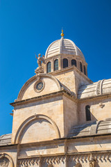 Fototapeta na wymiar Croatia, city of Sibenik, cathedral of St. James, triple-nave basilica, detail of dome and sculptures on roof