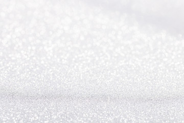 Silver white sparkle bokeh background
