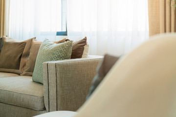close up white beige soft pillows on bed and blanket bedroom interior design concept.bed maid luxury ideas concept