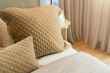 close up white beige soft pillows on bed and blanket bedroom interior design concept.bed maid luxury ideas concept