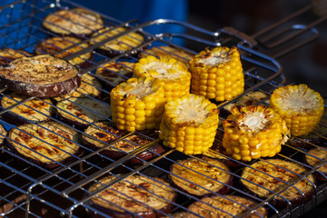 Background of grilled vegetables on a grill macro. horizontal view from above