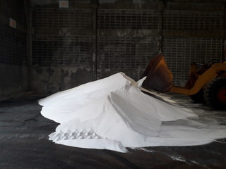 White chemical fertilizer pile in the warehouse 