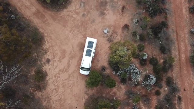 Aerial of camper van parked at remote bush camp in Australia