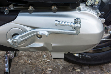 Motorcycle starter background. Motorcycle kick starter for engine