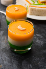 Tiranga / Tricolour sweet food made using indian flag colours and served in a glass in layers....