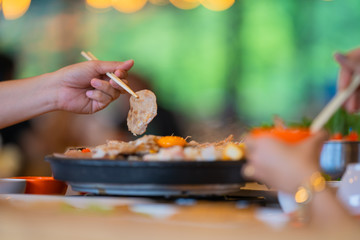 Selective focus Shabu Shabu and Sukiyaki, Japanese food with grill and pot boil