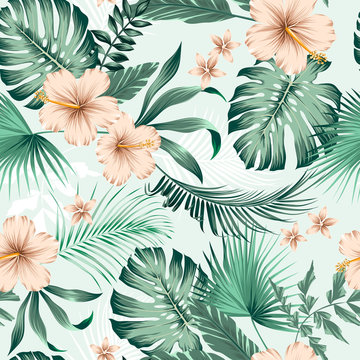vector seamless botanical tropical pattern with flowers. Lush foliage floral design with monstera leaves, areca palm leaves, fan palm, hibiscus flower, frangipani flower. Modern allover background.