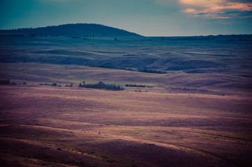 Fototapeta na wymiar Steppe hills summer beautiful twilight landscape
