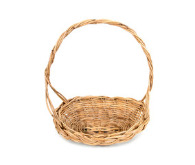 Fototapeta premium Weave rattan wood tray basket with handle isolated on white background. Wicker wooden basket isolated