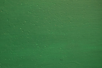 The texture of the surface painted green.
