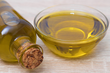 extra virgin olive oil in glass container