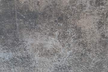 Dark gray old cement wall background close up