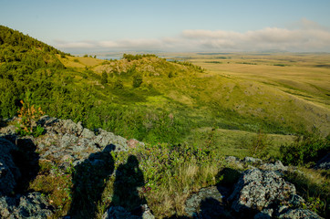 Mountain landscape hills with shadows tourists tourism travel