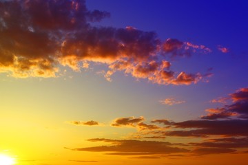 pretty colorful sunset or sunrise clouds in the sky for using in design as background.