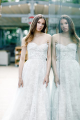 Naklejka premium Gorgeous beauty young bride portrait. Beautiful bride with wedding makeup