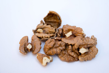 Walnuts kernels on white background. Healthy food.