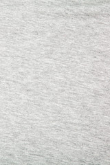 Real heather grey knitted fabric made of synthetic fibres textured background