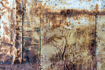 rusty metal sheets background. wall of iron strips rusty