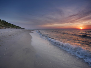 Morze zachód słońca - Dziwnówek Dziwnowo plaża fala