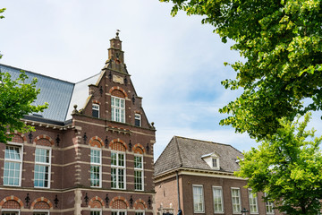 Fototapeta premium detail of historical building in street called Vloeddijk, in Kampen, The Netherlands