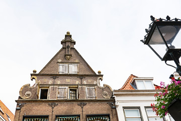 old gable with wooden shutters in Kampen, The Netherlands