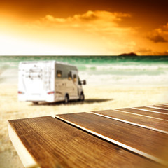 Desk of free space and summer beach background 