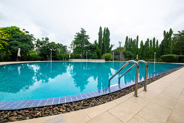 Fototapeta na wymiar Outdoor Big Beautiful Swimming Pool in the Park