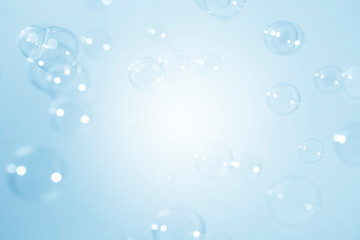 blue soap bubbles background.
