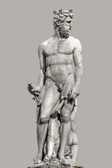 Fototapeta na wymiar Statue of powerful Neptune at fountain in Signoria square, Florence, Italy