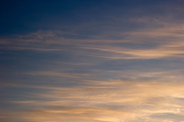 The sky at sunset with orange clouds. Background, texture