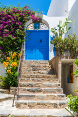 Beautiful front door with flowers of a house in Ischia island , italy