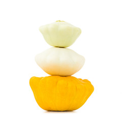 Three pattypan squashes (Cucurbita pepo) isolated over white background, clipping path