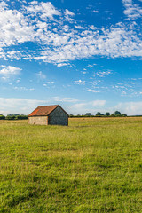 Fototapeta na wymiar A barn in the Sussex countryside, on a sunny summers day