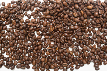 Roasted coffee beans brown seeds texture background wallpaper.