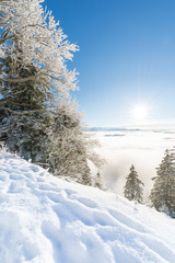 Bright sun in winter in the Alps mountains.