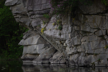 Beautiful Fjadrargljufur canyon with river and big rocks. Bucky Canyon fast river